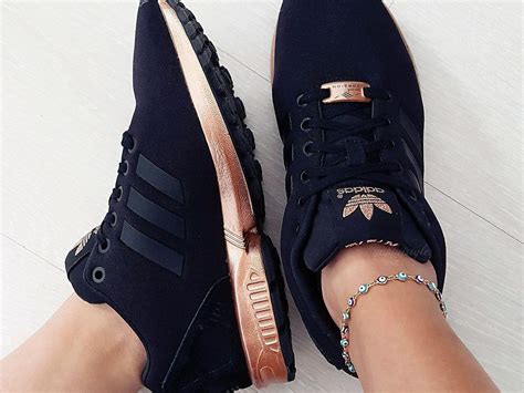 wo bekommt man schwarz goldene adidas flux her|Schwarze adidas ZX Flux .